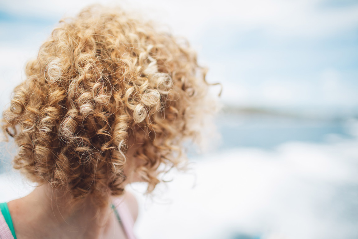 Woman looking toward the horizon, recognizing the signs of thyroid health changes