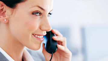 Friendly staff member ready to help women get started with their hormone therapy consultation