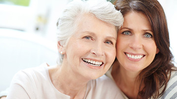 Mother and daughter smiling together, representing women of all ages benefiting from personalized hormone therapy